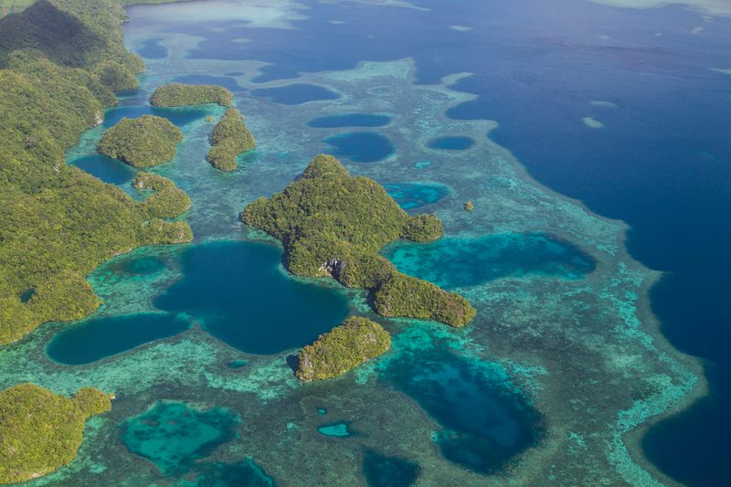 Aerial view of Palau's Rock Islands with turquoise lagoons