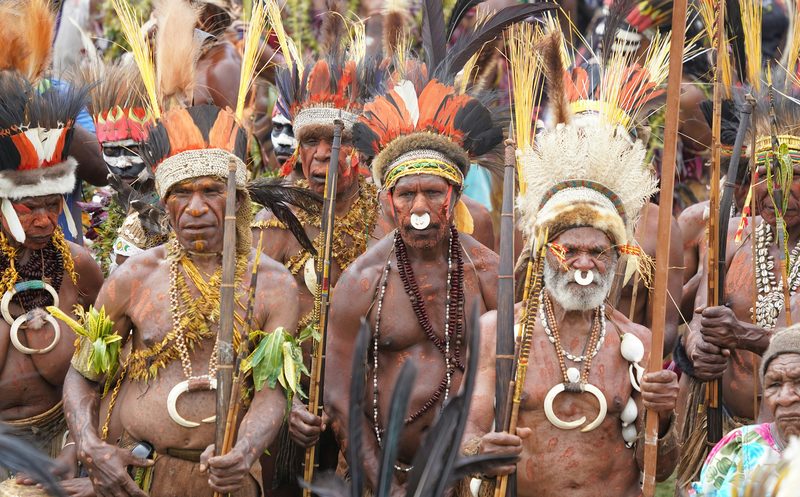Tribal sing-sing gathering with traditional regalia in the Papua New Guinea highlands