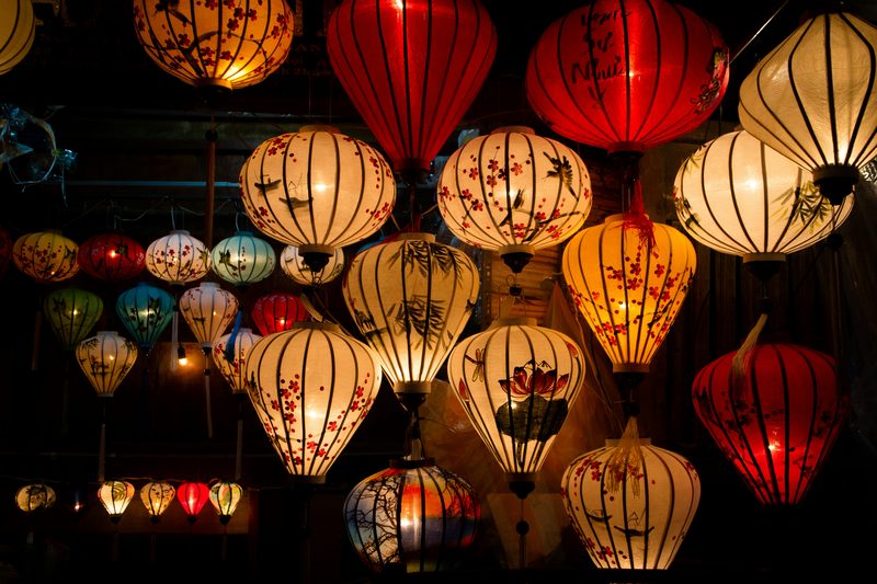 Colorful silk lanterns glowing at night in Hoi An ancient town
